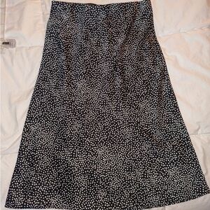 Loft brand with elastic waist. Very silky and great for business attire.